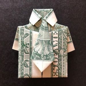 Origami shirt and tie handmade from dollar bill.